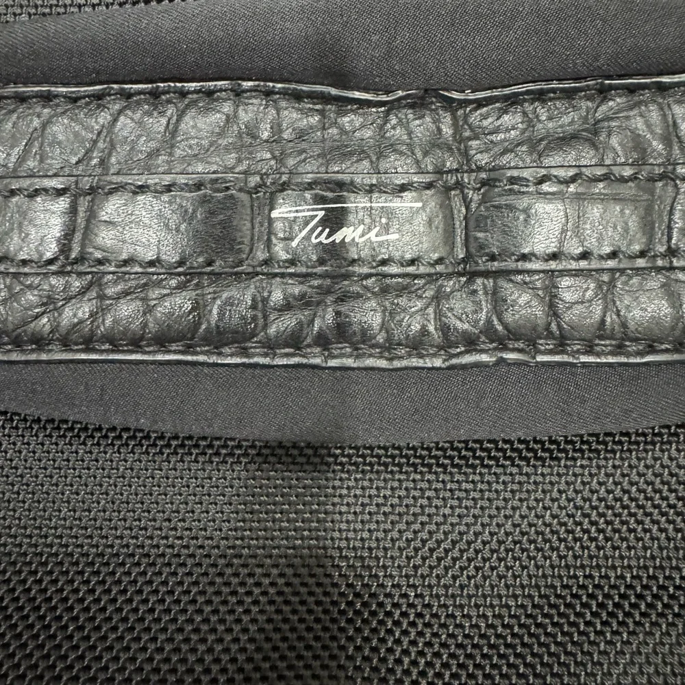 Tumi Travel Black Briefcase with Leather Finish and Metal Accents